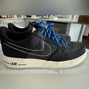 Nike Black and Blue Air Force Ones.